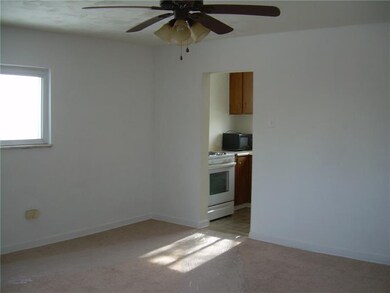 Spacious dining room leads to the kitchen.