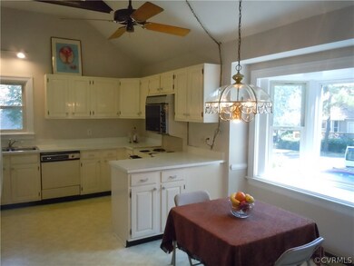 Eat-In Kitchen with Vaulted Ceiling and Bay Window