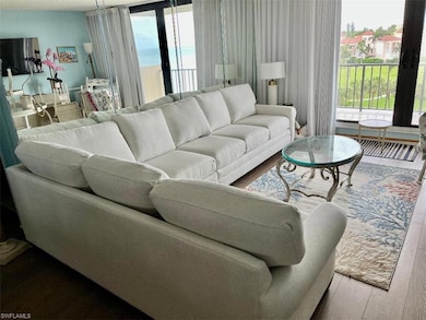 Living room with wood-type flooring