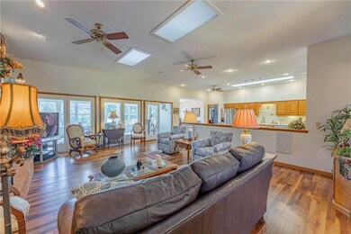 Large great room with solid cherry wood floors and sound system