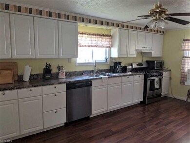 The spacious eat-in kitchen has been remodeled. Wh
