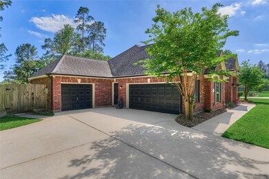 This home features a three-car garage along with a