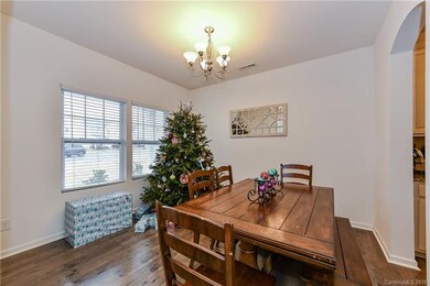Dining room with archway to the Butler's Pantry