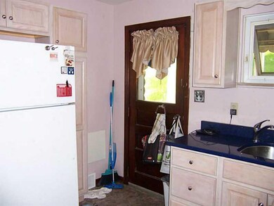 Kitchen. Custom counter tops and blonde cabinets.