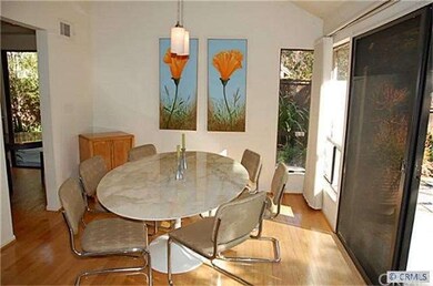 Formal dining room/ slider looks out on beautiful 