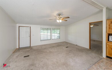 Unfurnished living room with lofted ceiling, ceili