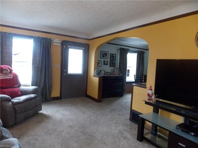 Living room opens to formal dining room.