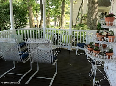 Elevated wrap front porch with gazebo