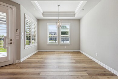 Unfurnished dining area featuring light hardwood /