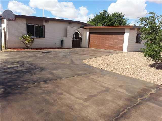 Exterior Front. Double car garage w/ doo