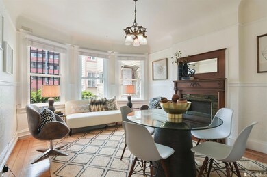 There is a formal dining room at the back of the u