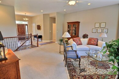 Open concept living room with gas log fireplace