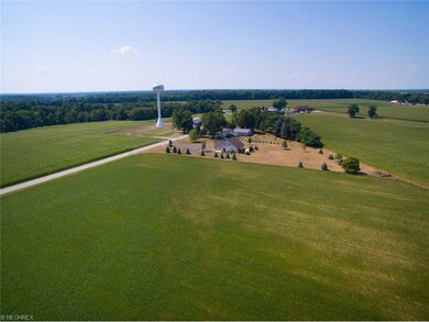 Soy beans are planted in the forefront of the prop