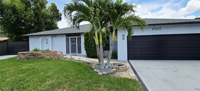 Ranch-style home featuring stucco siding, concrete
