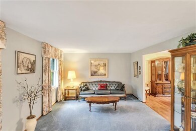 Large living room to the left of the entry feature