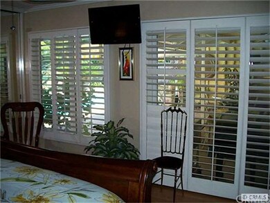 Plantation shutters through out home. Another view