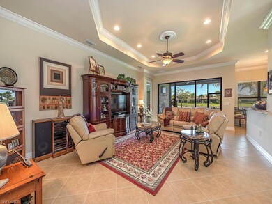 Great Room with Tray Ceiling and Crown Molding