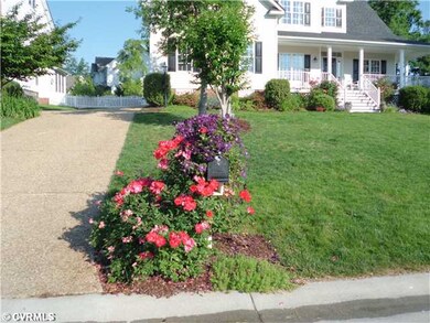 Other - Beautiful blooming flowers surrounds this lovely home