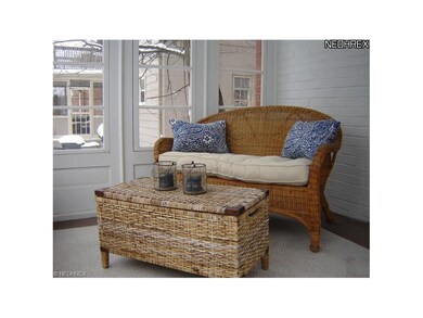 Delightful three season enclosed porch with ceilin