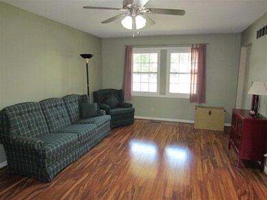 Large Living and Dining Rooms have newer wood lami