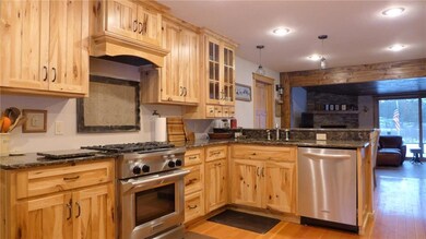 Ample storage with floor to ceiling pantries.
