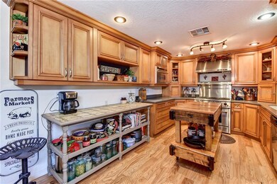 Gourmet kitchen with all stainless appliances.