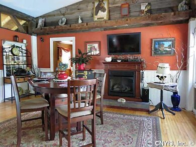 Kitchen enjoy dining in front of the gas fireplace