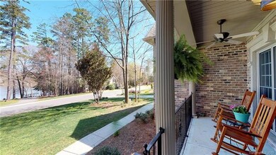 Covered rocking chair front porch with ceiling fan