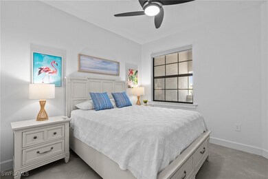 Bedroom with baseboards and a ceiling fan