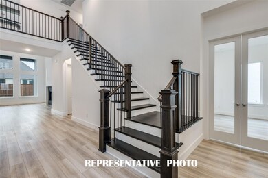 This gorgeous open and airy entry is the perfect p