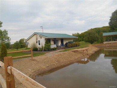 Nice landscaping and a brand new pond! Pond is sti