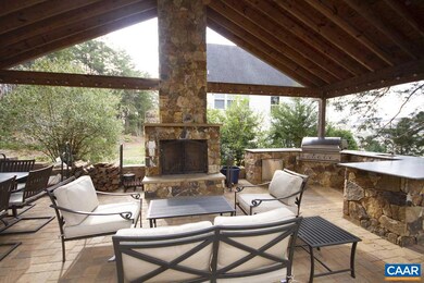 Seating area with view of wood burning fireplace.