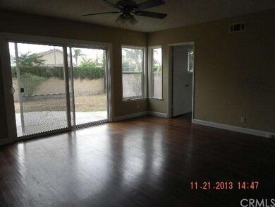 Spacious living room.  Sliding door to backyard.