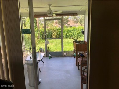 Sunroom / solarium featuring ceiling fan