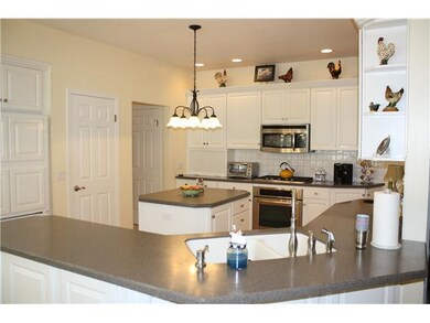 Kitchen. Eat-in kitchen with solid surface counter