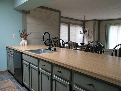 Kitchen. New ceramic tile, sink, faucet, and hardw