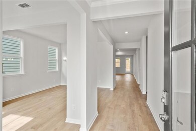 Hallway featuring light wood-type flooring