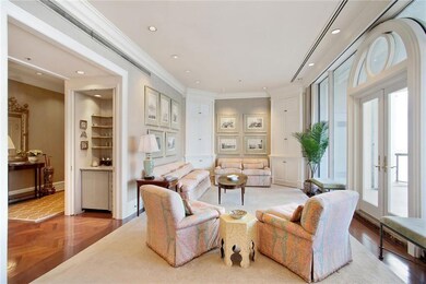 LIVING ROOM WITH BUILT-IN CORNER CABINETS, FRENCH