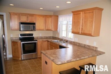 1604 W 67th St, Davenport, IA 52806 - photo 2