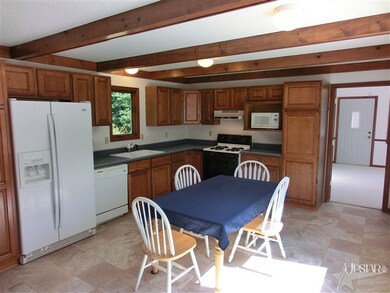 Kitchen, new window & door to deck