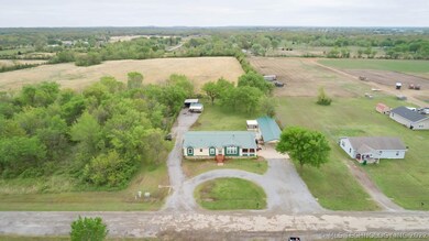 Surrounded by vacant land on three sides and on a