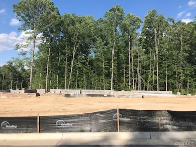Flat lot with treed backyard and common area behin