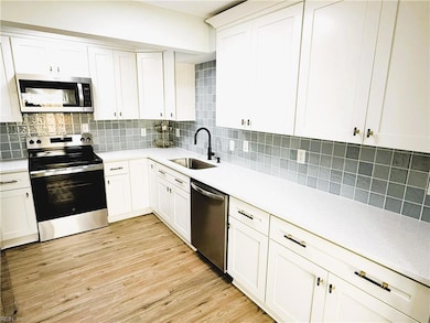 Quartz Counter Tops, High End Stainless Steel Appliances, Ceramic Tile Backsplash