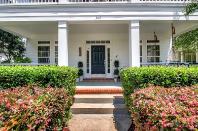 This picture perfect front porch is just the beginning of the charm you experience once you walk through the front door. 
