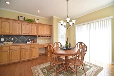 Spacious eat-in kitchen with slider to backyard. B