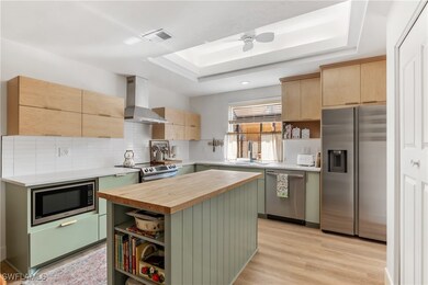Kitchen featuring appliances with stainless steel