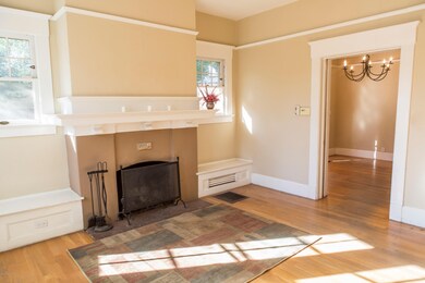 LIVING ROOM WITH ENTRANCE TO DINING AREA