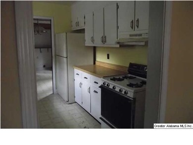 Galley kitchen with all appliances.