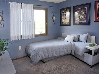 6639 84th - Bedroom on upper level. Featuring new carpet.