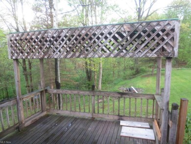 View of 12'x 12' wood deck with covered BBQ area t